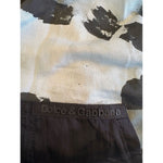 Dolce & Gabbana Multicolor Camouflage Men Hooded Sweater with logo detail, close-up view of design and fabric texture.