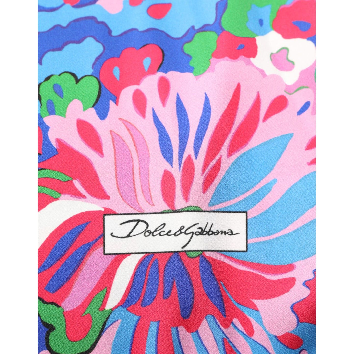 Dolce & Gabbana Multicolor Floral Printed Tunic Blouse Top with vibrant floral design and logo accent.