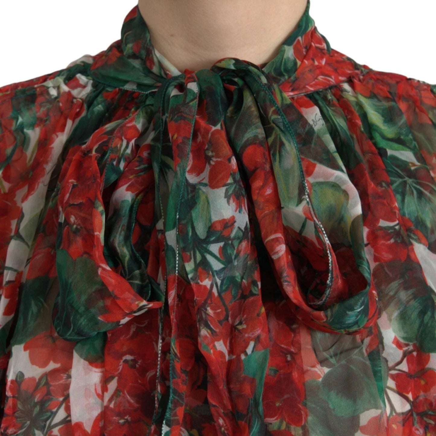 Dolce & Gabbana Multicolor Floral Silk Collar Blouse with red and green floral pattern, featuring an ascot collar, button closure, 100% silk.