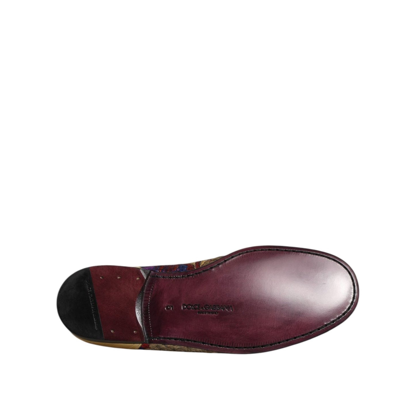 Underside view of Dolce & Gabbana Multicolor Jacquard Gold DG Logo Loafer Shoes showcasing sole and craftsmanship.