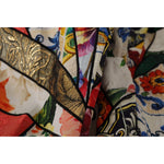 Close-up of Dolce & Gabbana Multicolor Patchwork Jacquard High Waist Pants fabric showing intricate floral and geometric designs.