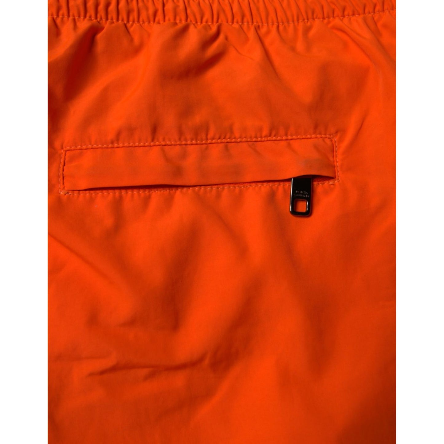 Dolce & Gabbana Orange Polyester Beachwear Shorts 2Pc Swimwear with zip-fastening rear pocket detail.