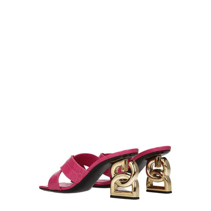 Dolce & Gabbana Pink Leather Platforms with gold accented heels and open toe design. Casual style sandals for women.