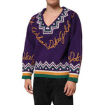 Man wearing Dolce & Gabbana Purple Wool DG Logo Men Knit Pullover Sweater featuring signature logo and vibrant design.