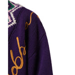 Dolce & Gabbana Purple Wool DG Logo Men Knit Pullover Sweater close-up of sleeve and knit design.