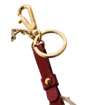 Dolce & Gabbana Red Yellow Mini Espadrille Style Charm Keychain Keyring with gold hardware and logo details, close-up view.