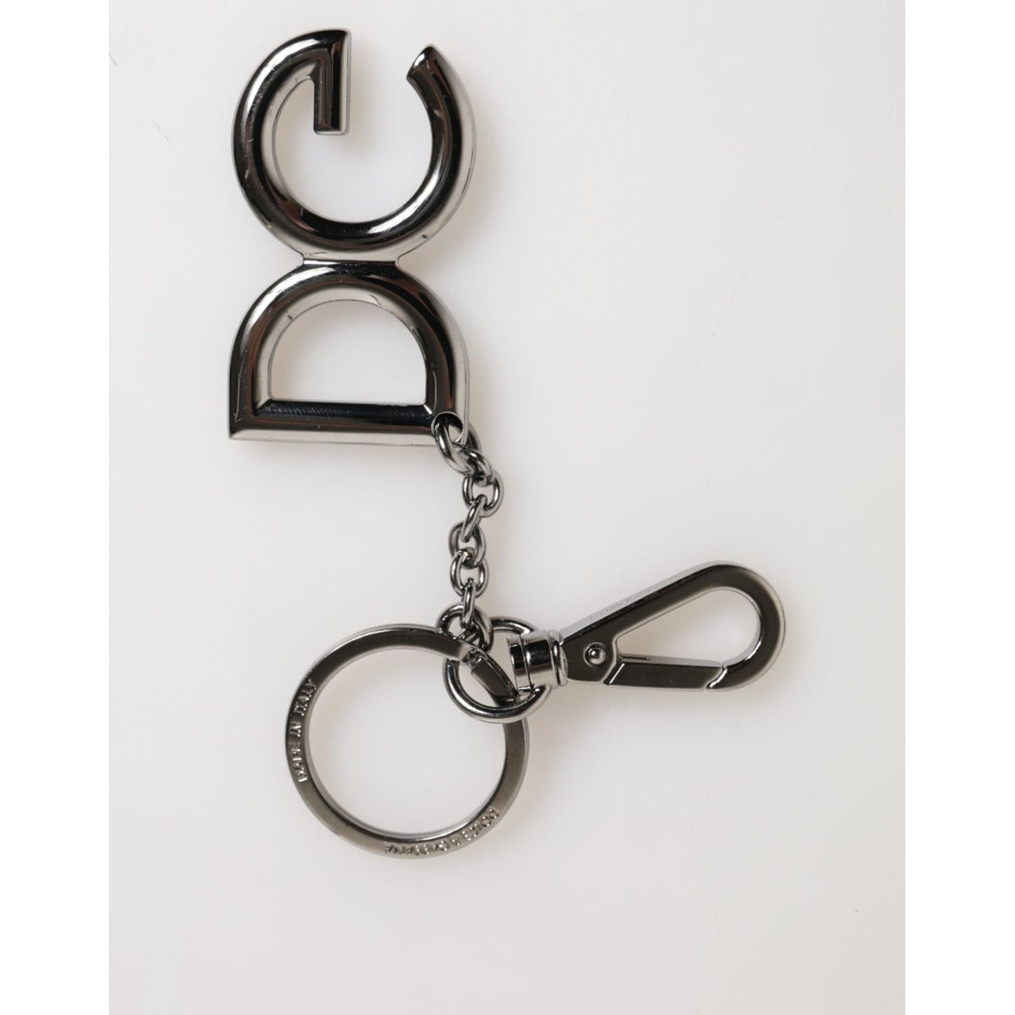 Dolce & Gabbana Silver Brass DG Logo Metal Keychain Holder Men Keyring close-up on white background.