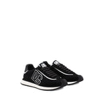 Dolce & Gabbana Sneakers Black with lace-up fastening, rubber sole, branded heel, and logo patch.