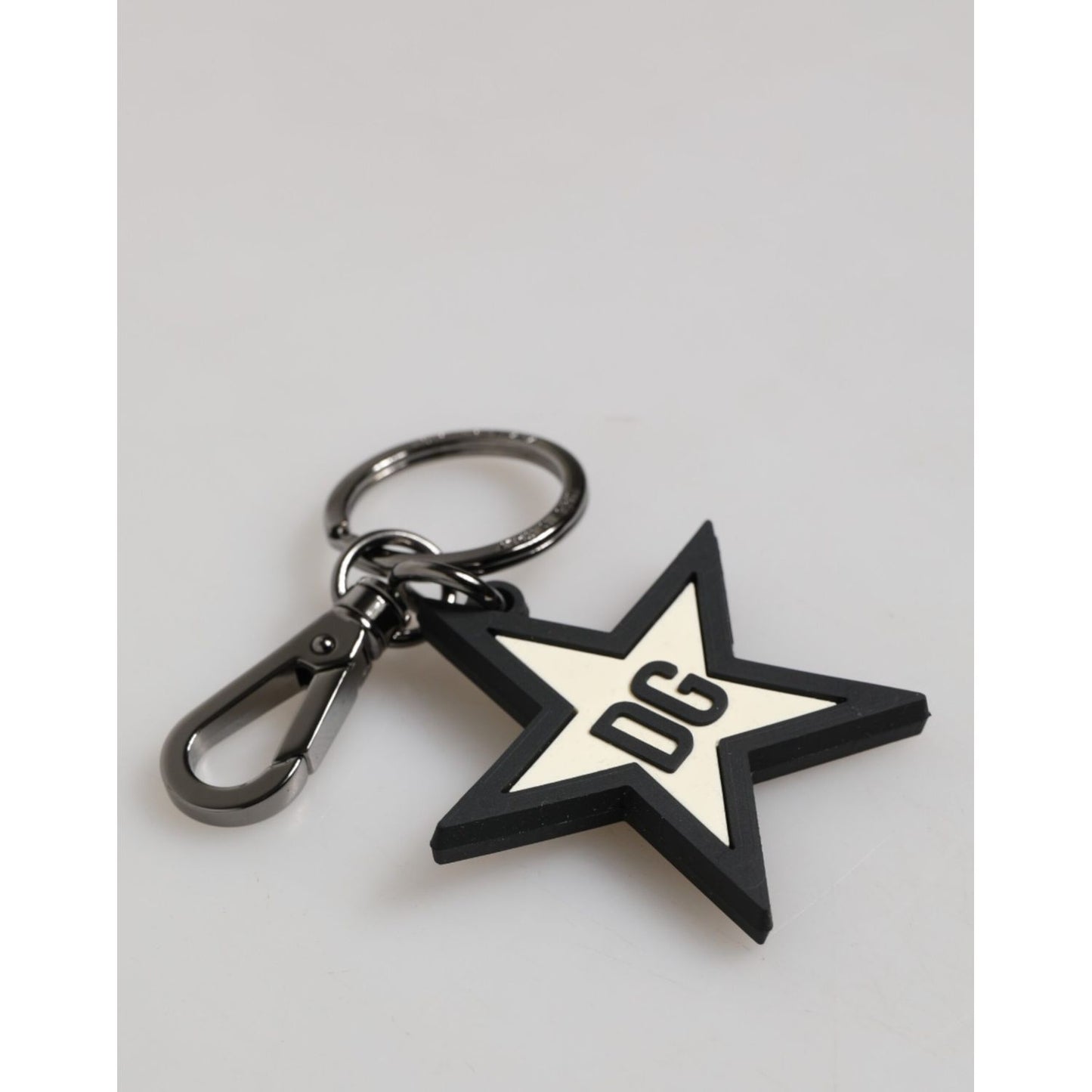 Dolce & Gabbana White Black DG Logo Star Rubber Men's Keychain Keyring with silver brass ring and engraved metal hardware.
