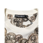 Dolce & Gabbana White Coin Print Cotton Crew Neck Men T-shirt showcasing detailed coin motif on fabric close-up.