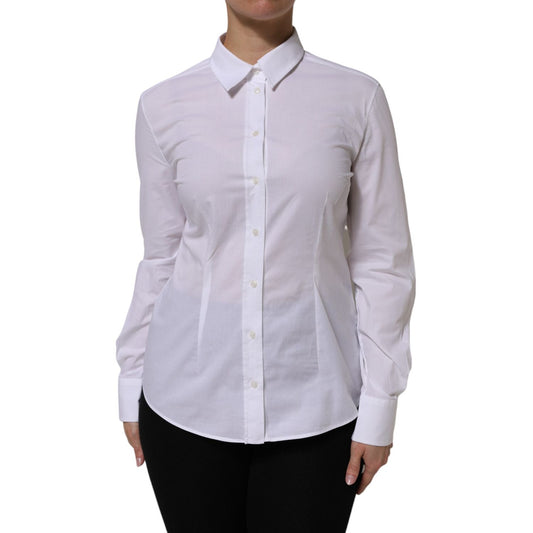 Model wearing Dolce & Gabbana White Cotton Collared Buttoned Dress Shirt Top with long sleeves and elegant design.