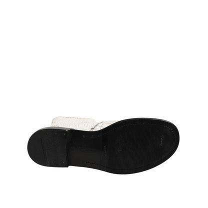 Sole view of Dolce & Gabbana White Lambskin Leather Mid Calf Boots Shoes showcasing sturdy design and craftsmanship.