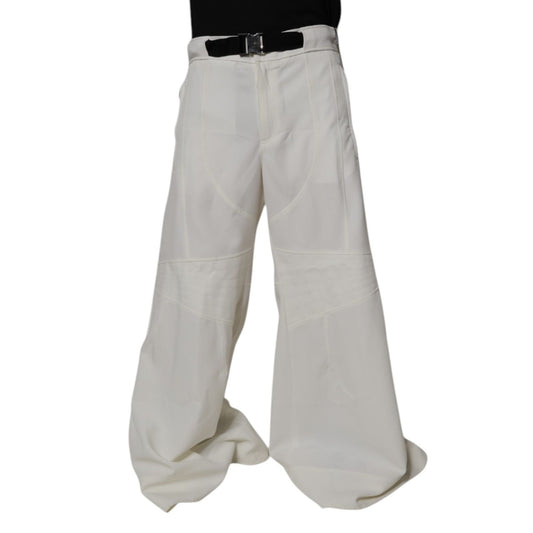 Dolce & Gabbana White Mid Waist Wide Leg Pants with zipper closure and logo details, made from 100% polyester in Italy.