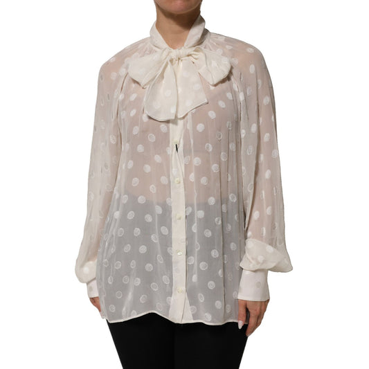 Dolce & Gabbana White Polka Sheer Silk Bow Tie Shirt Blouse Top on mannequin, showcasing elegant polka dot design.