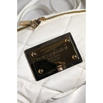 Close-up of gold-tone logo plaque on Dolce & Gabbana White Quilted Logo 90's Sicily Belt Waist Fanny Pack Bag.