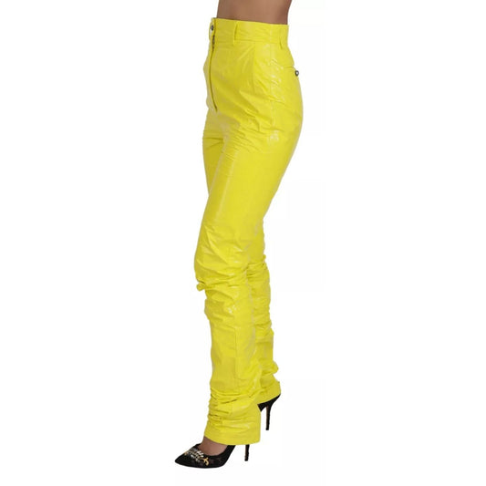 Dolce & Gabbana Yellow High Waist Skinny Women Trouser Pants with zipper and button closure, regular fit, made in Italy.