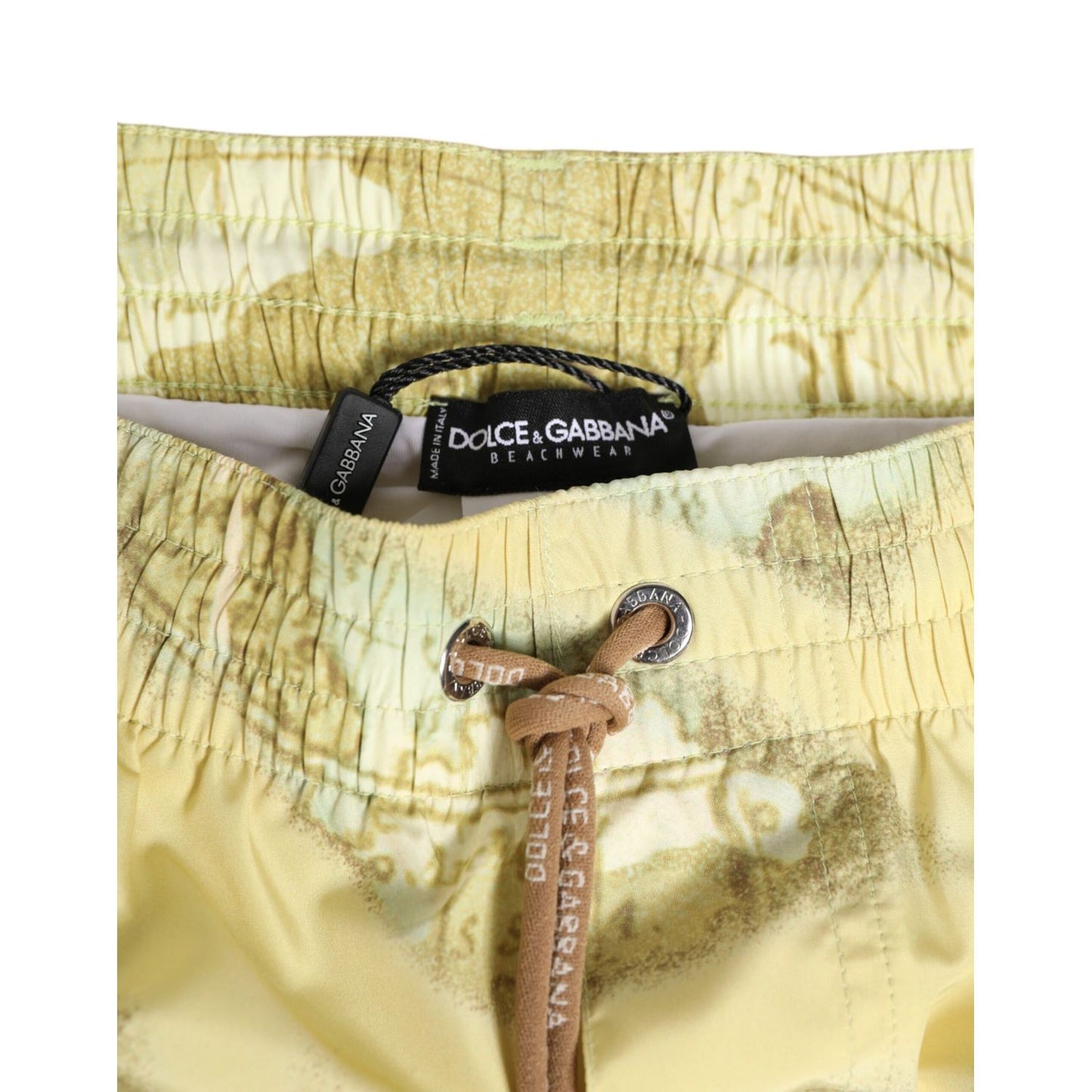 Dolce & Gabbana Yellow World Map Polyester Elastic Waistband Swimwear with logo detail and drawstring fastening on display