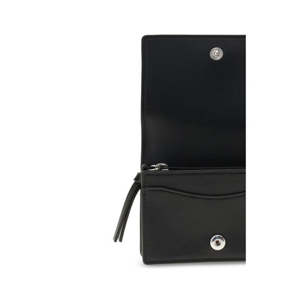 Open view of Ganni Black Recycled Leather Wallet showing interior compartments with silver button closure, perfect blend of style and utility.