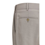 Back view of Gi Capri Virgin wool Suit pants with buttoned welt pocket and belt loops in a refined design.