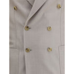 Close-up of Gi Capri Virgin wool Suit blazer with double-breasted button closure and welt patch pockets.
