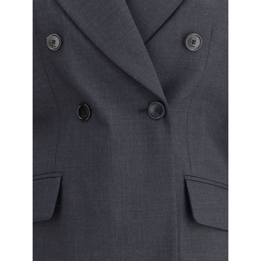 Gucci Gray Wool Clothing double-breasted blazer with spear lapels and welt pockets, elegant and sophisticated design.