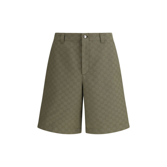 Gucci Green Cotton Bermuda Shorts with GG pattern, front zipper, button closure, and belt loops, blending heritage and modernity.