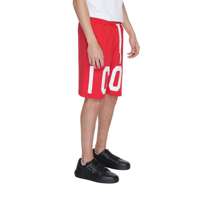 Model wearing Icon Red Cotton Bermuda Shorts with bold ICON print, featuring adjustable drawstring and side pockets.