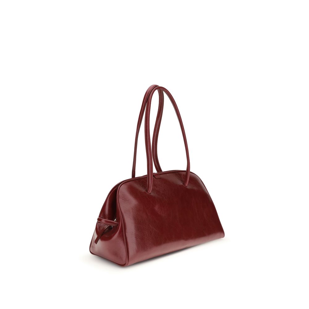 Jacquemus Red Calf Leather Bos Taurus Shoulder Bag with double-zip closure and elegant knotted handles, shown in a side view.