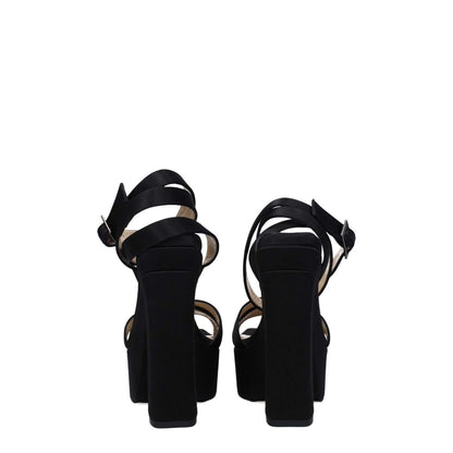 Jimmy Choo Black Satin Platform Sandals with high heels and buckle closure, featuring an open toe design and leather sole.