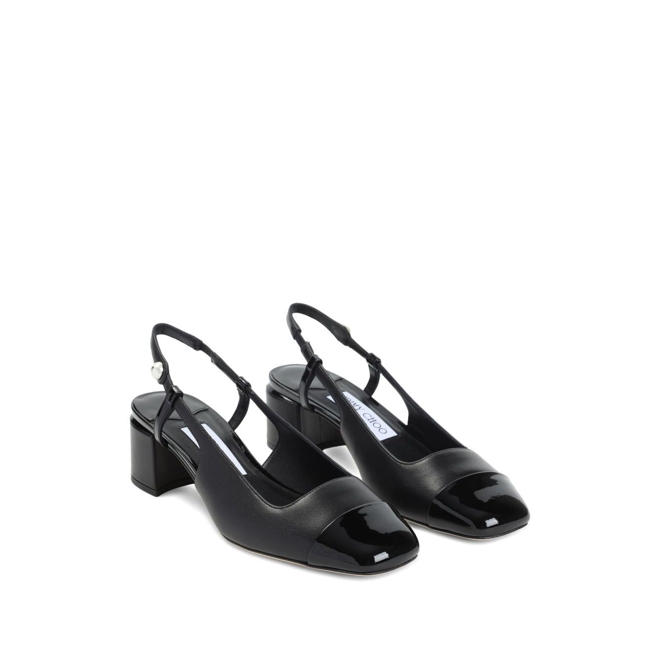 Jimmy Choo Elisa Sling Back 45 Patent and Nappa Leather Pumps with black slingback strap, pearl button, and contrasting toecap.