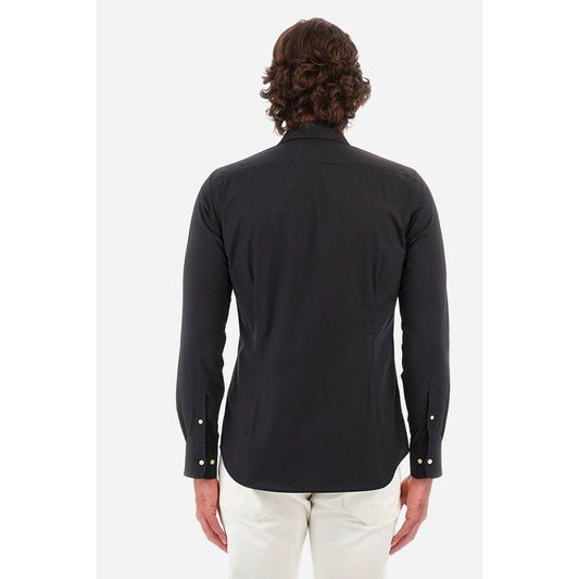 Back view of model wearing La Martina Blue Cotton Shirt with slim fit and chest embroidery detailing.