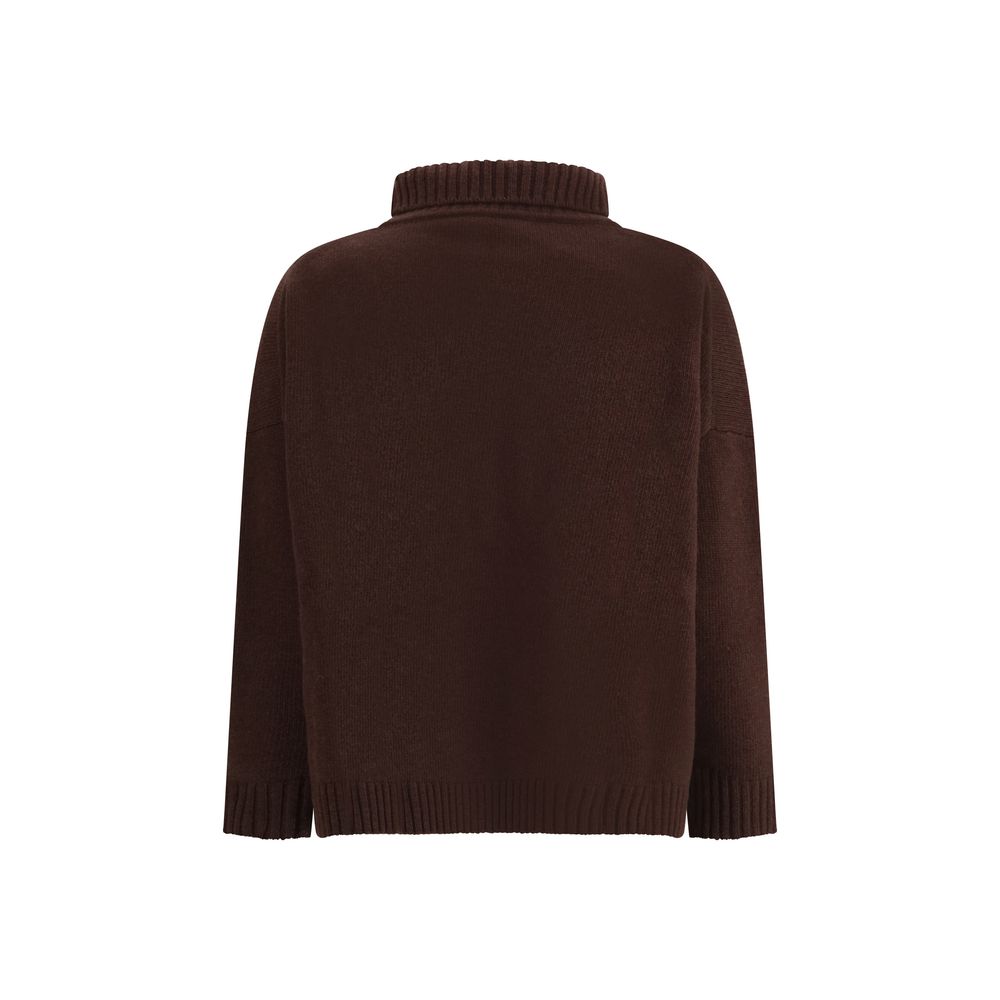 Back view of Max Mara Brown Fleece Wool Turtleneck with ribbed edges and oversized fit, perfect for cozy autumn and winter style.