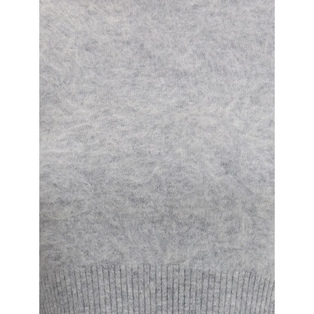 Close-up of Max Mara Gray Cashmere Cashmere Sweater highlighting its texture and ribbed hem, perfect for timeless elegance in AW25.
