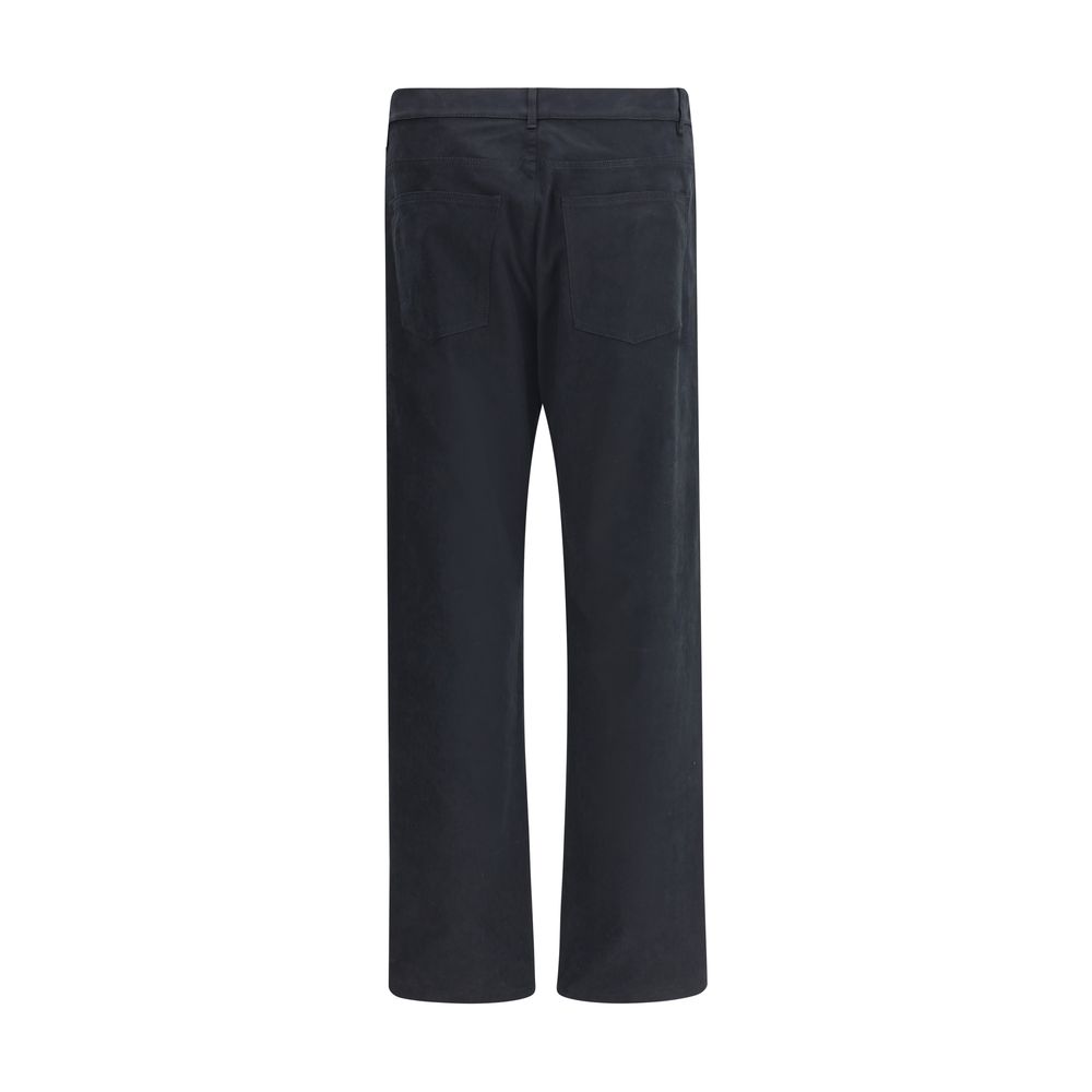Back view of Moschino Black Cotton Casual Pants with straight-leg cut, highlighting signature patch, five-pocket design, and zip-button closure.