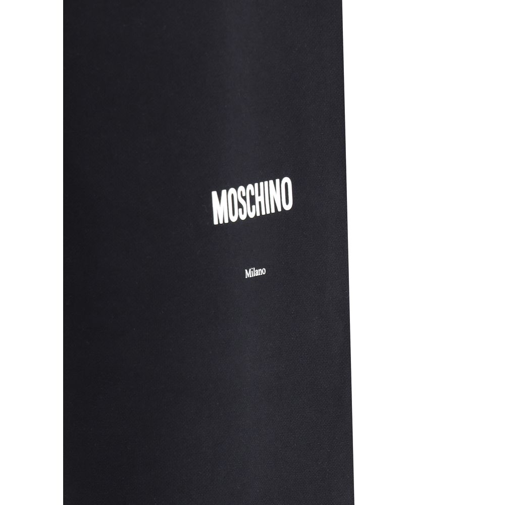 Close-up of Moschino Black Cotton Joggers (Workout Pants) showcasing logo detail on fabric.