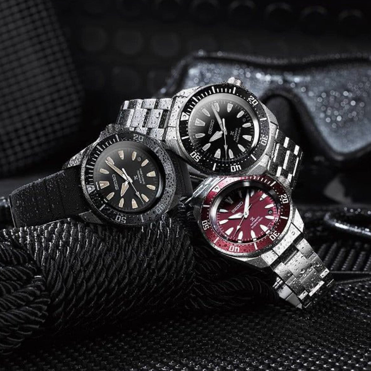 SEIKO PROSPEX Mod. SAMURAI Automatic Diver's 200 watches display with wet textures and diving gear background