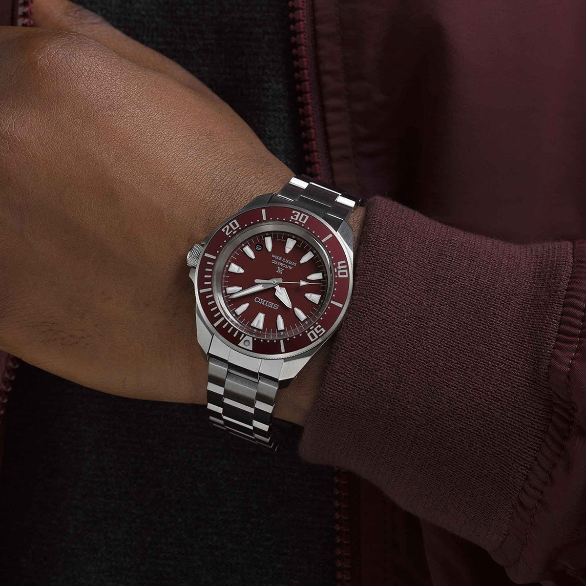 SEIKO PROSPEX Mod. SAMURAI Automatic Diver's 200 on wrist, stylish men's watch with red and silver design, durable for diving.