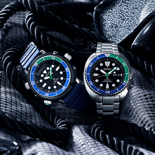 SEIKO PROSPEX Mod. TURTLE TROPICAL LAGOON Automatic Diver's 200 watches on a textured background.