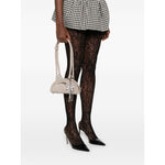 Model carrying Self-Portrait Suede mini shoulder bag in grey with bow detailing and top zip fastening, matching checkered skirt.