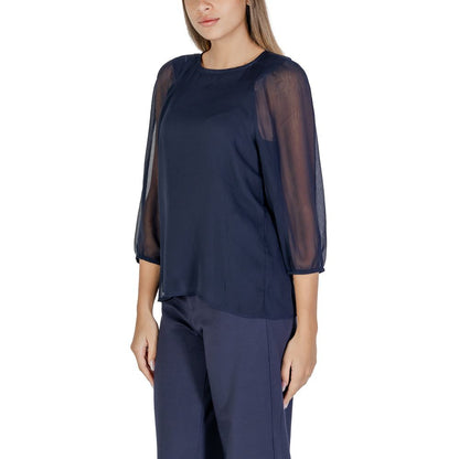 Street One Blue Polyester Blouse with semi-transparent sleeves, worn by a model, showcasing elegant and versatile fashion.