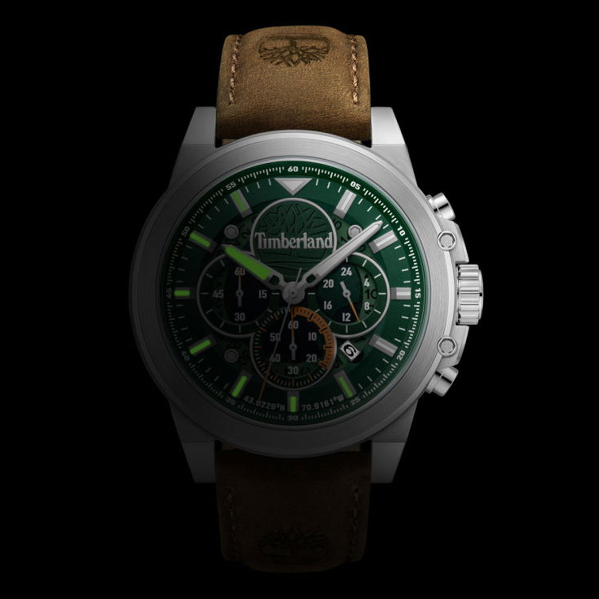 TIMBERLAND Mod. FAST STRIKE watch with brown leather strap and green dial on a black background.