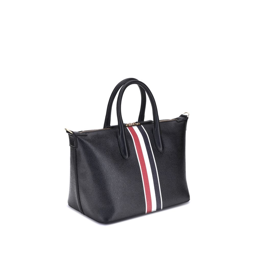 Front view with bag zipped and handles upright.