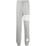 Thom Browne Trousers Grey with signature 4-Bar stripe and grosgrain loop tab, featuring drawstring waistband and pockets.