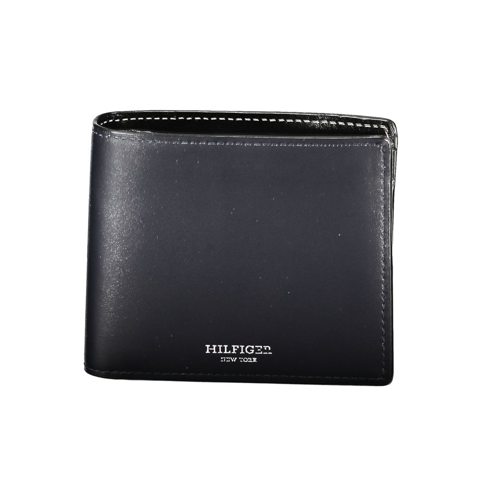 Tommy Hilfiger Blue Leather Wallet with two compartments, coin purse, card holder, contrast details, and logo.