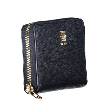 Tommy Hilfiger Blue Polyethylene Women Wallet with gold zipper and logo detailing, showcases fashion-forward style and functionality.