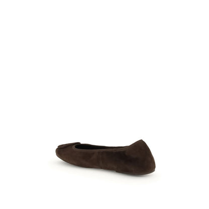 Tory Burch Brown Calf Leather Bos Taurus Ballet Flats showcasing side view of suede material and iconic logo.