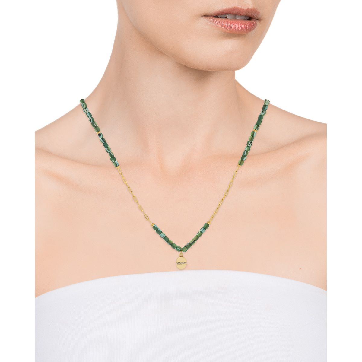 Woman wearing a green and gold necklace, VICEROY JEWELS Mod. 13040C100-92, showcasing elegant jewelry design for ladies.