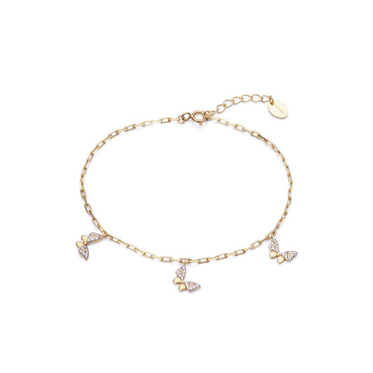 Gold bracelet with butterfly charms, delicate chain design, suitable for elegant wear. A dainty jewelry piece for women.