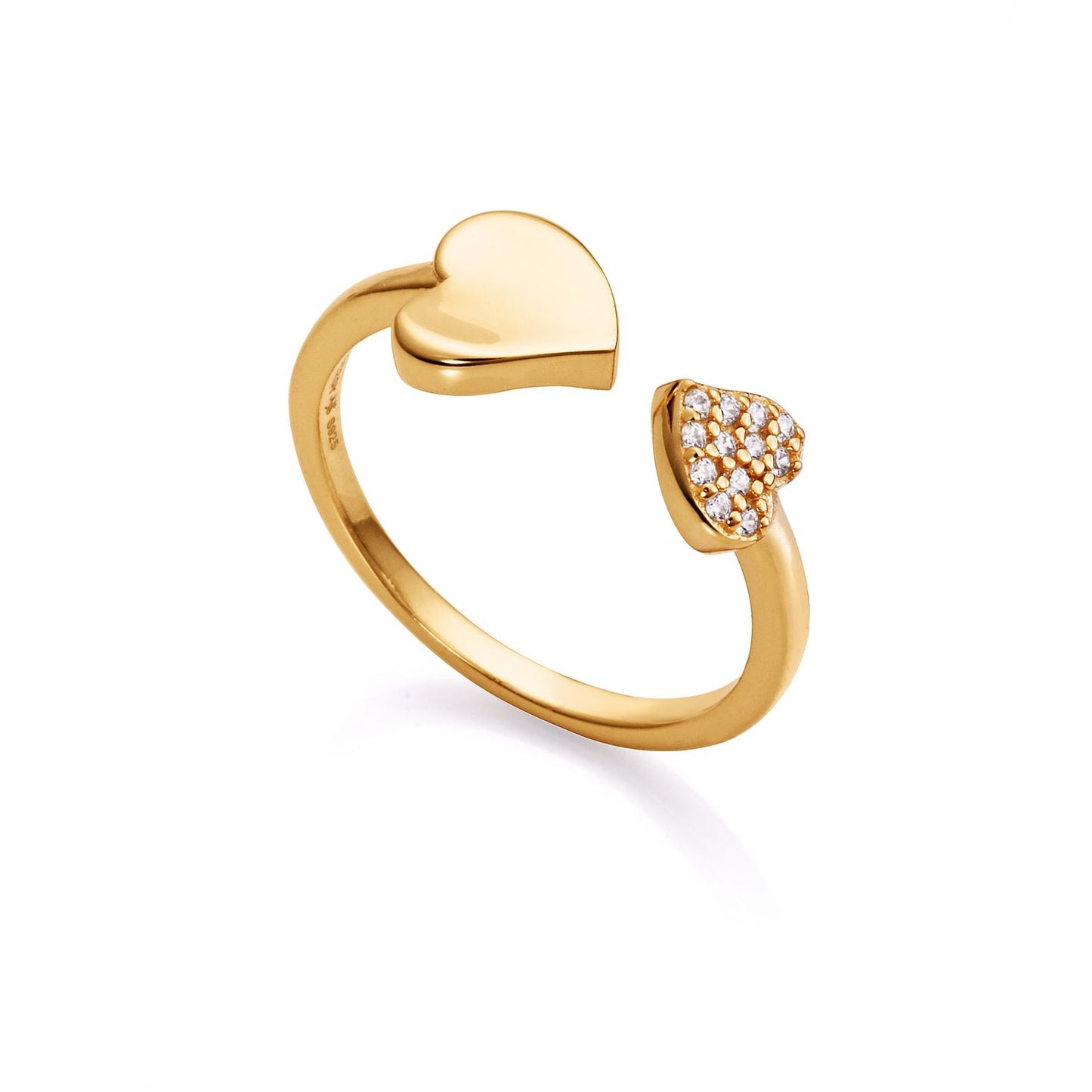 Heart-shaped gold ring with diamond accents on white background