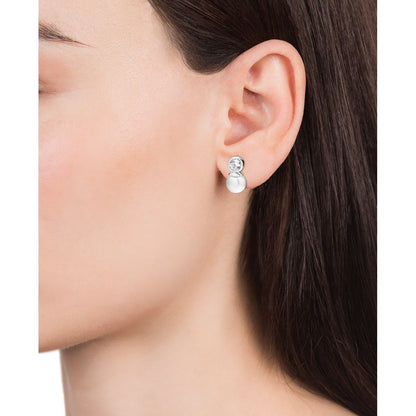 VICEROY JEWELS Mod. 71047E000-68 elegant lady's earrings in silver, worn on a female ear, featuring quartz analog design.